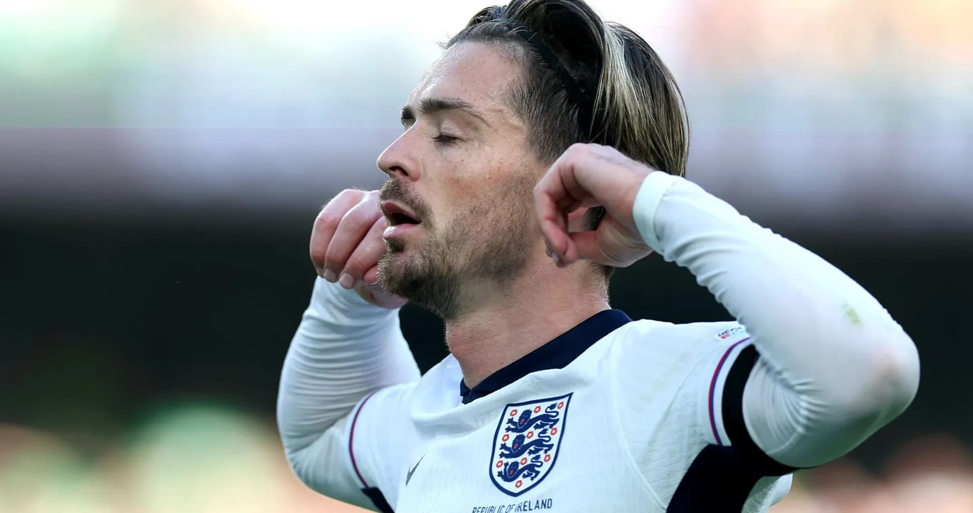 Player with eyes closed in England jersey