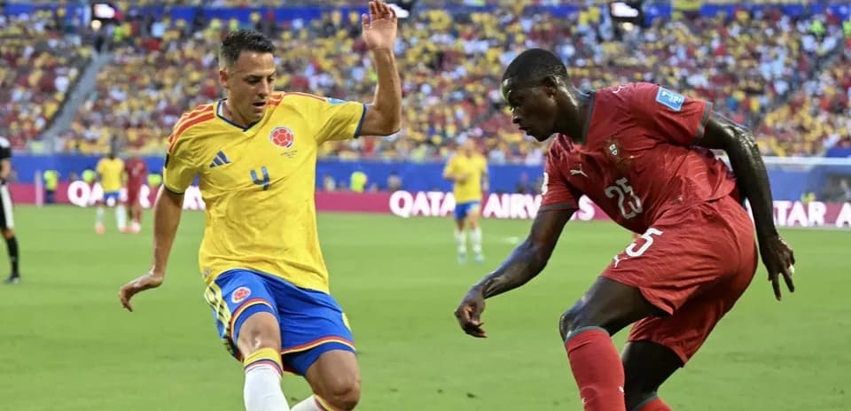 Colombian and Moroccan players contesting for the ball