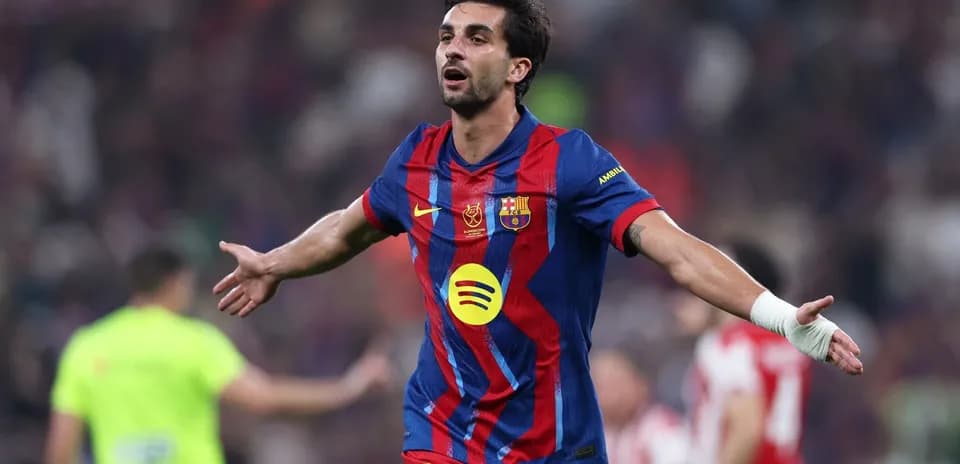 Player celebrating a goal on the field