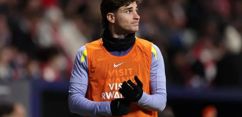 Player in training gear on the sidelines