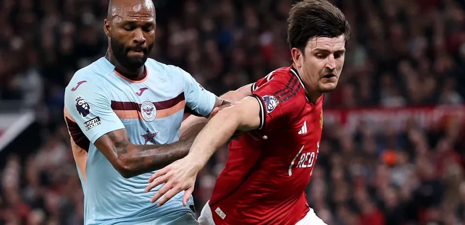 Manchester United player battling with Brentford opponent