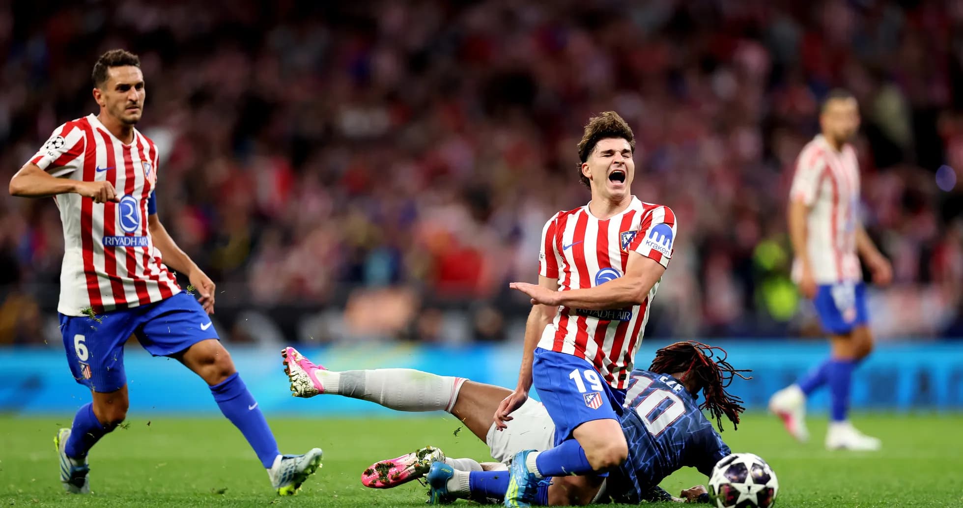 Atletico Madrid player falling during match