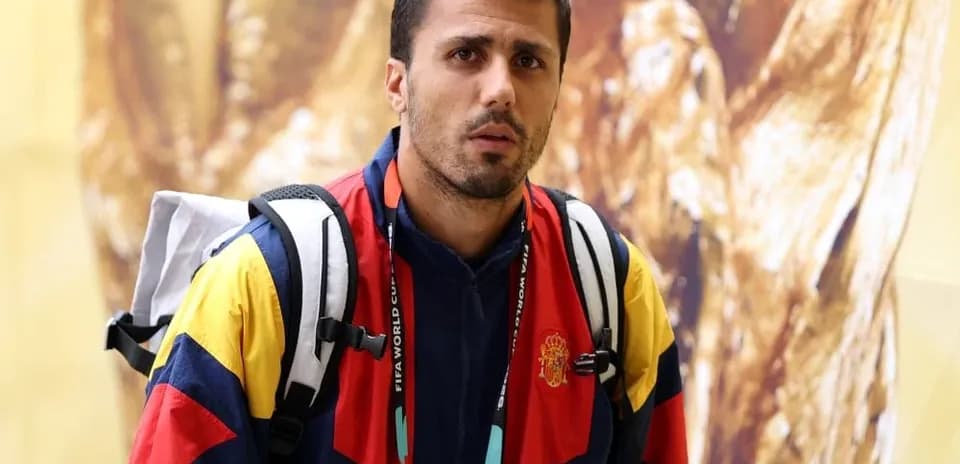 Athlete wearing a colorful jacket with backpack