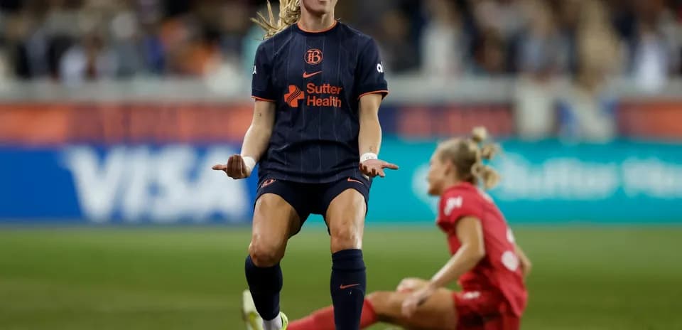 Player celebrating during NWSL match