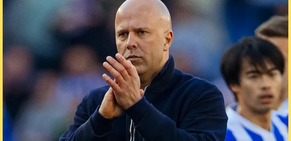 Coach clapping on the sidelines during match