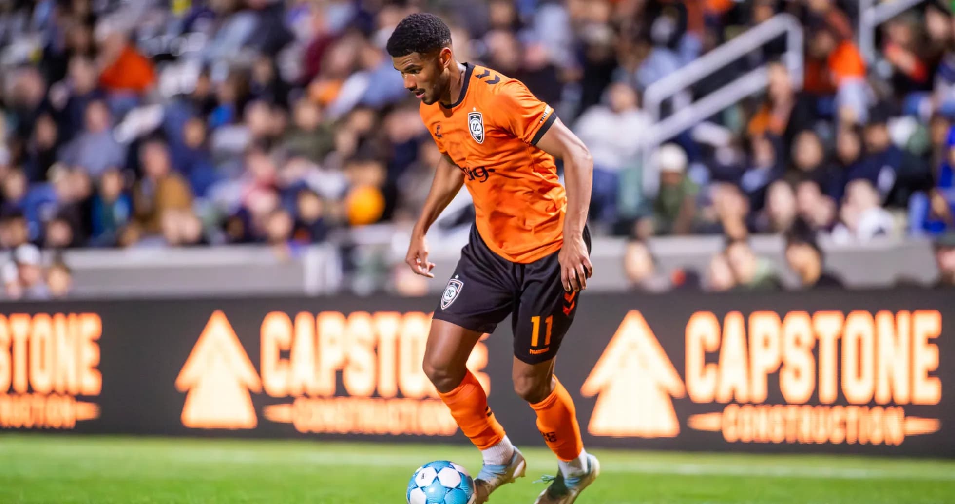Player dribbling the ball during match