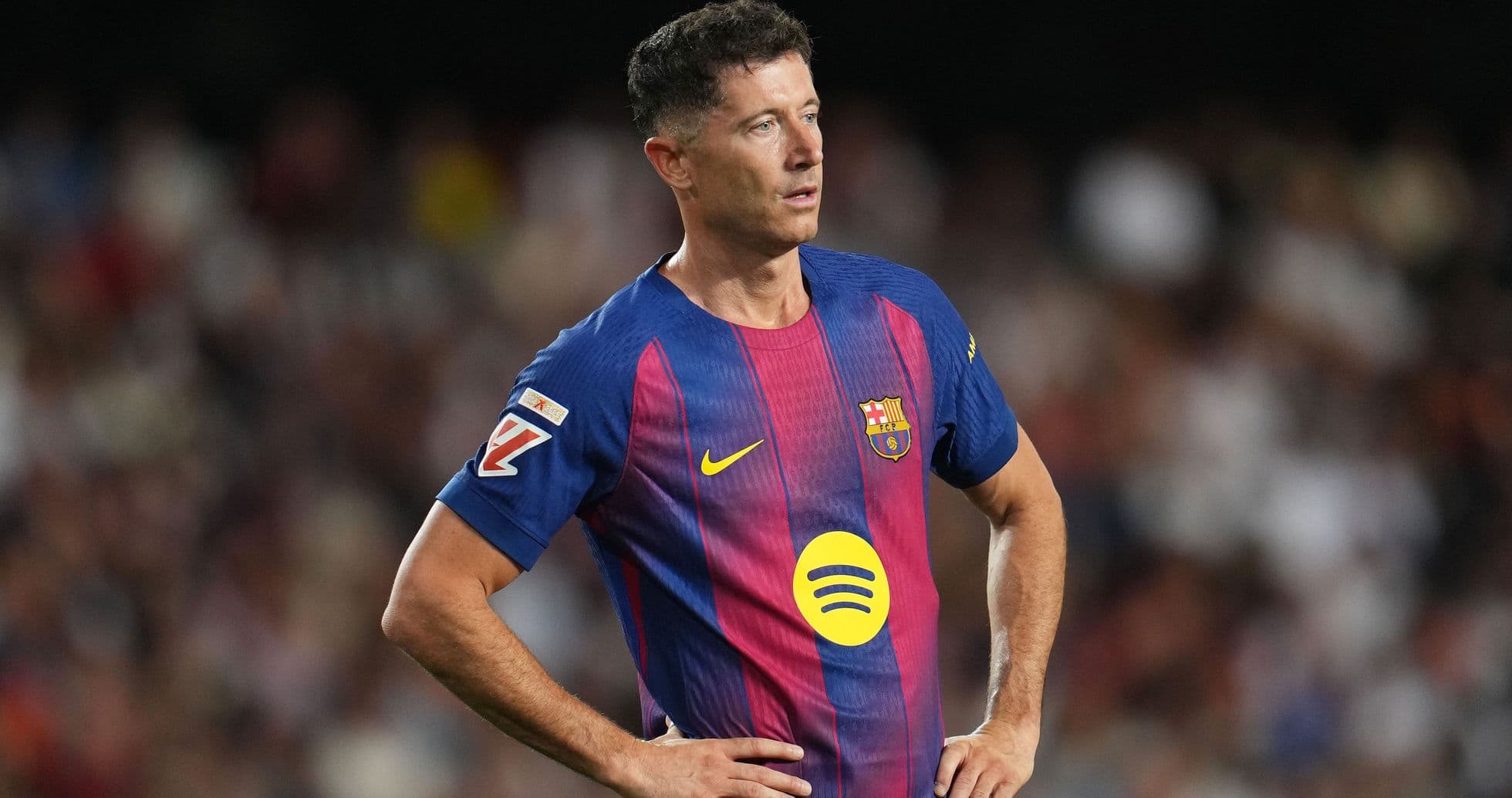 Player in Barcelona jersey during match action
