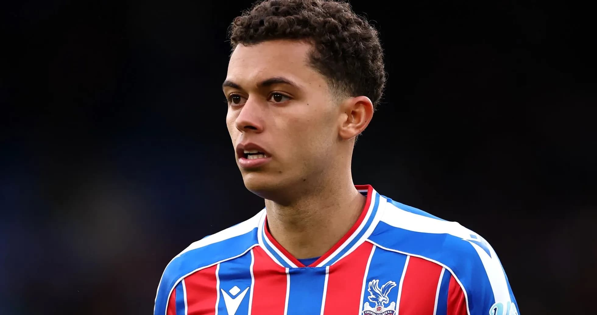 Player in Crystal Palace FC kit during match