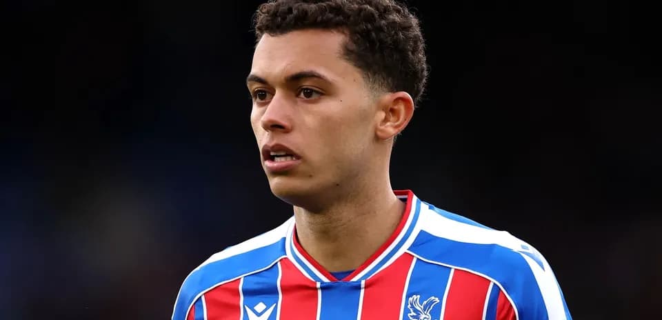 Player in Crystal Palace FC kit during match