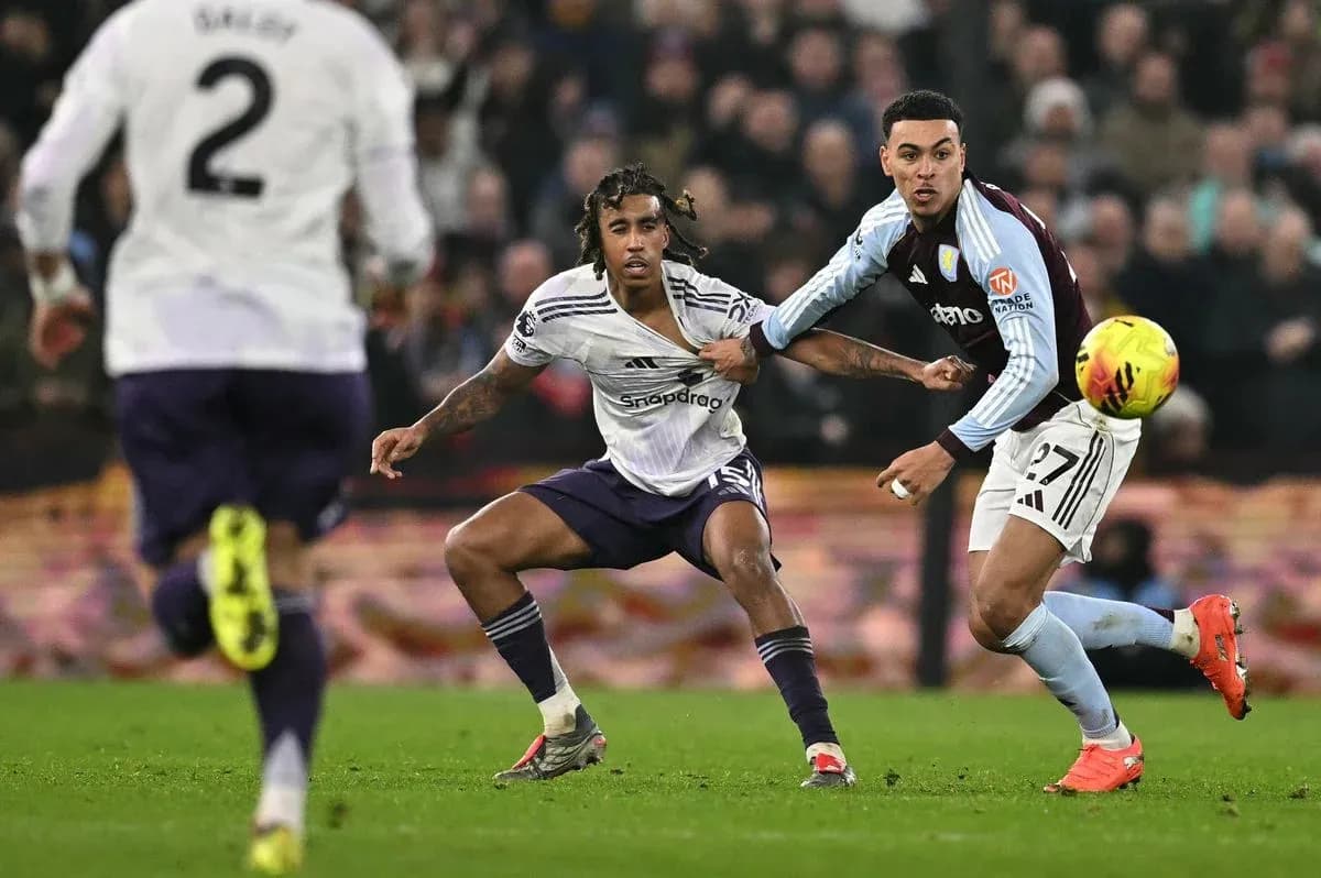 Players contesting the ball during Premier League match