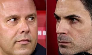 Two football managers focused during a match