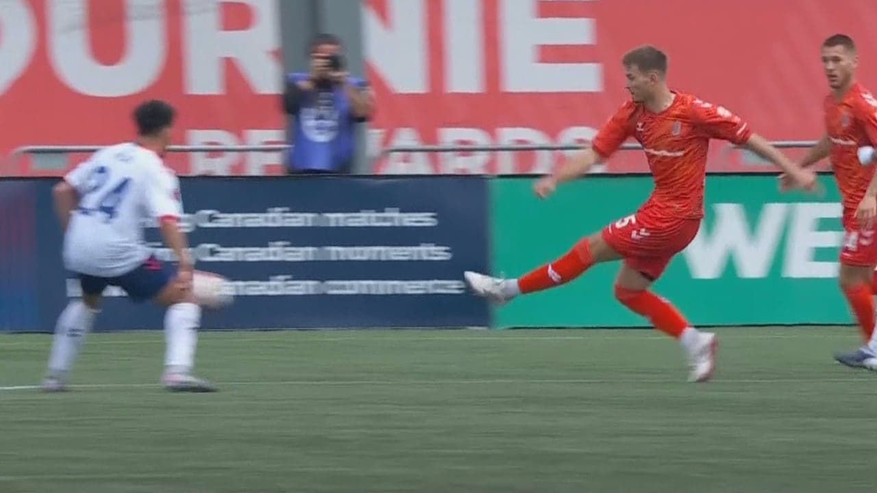 Player from Forge FC kicking the ball
