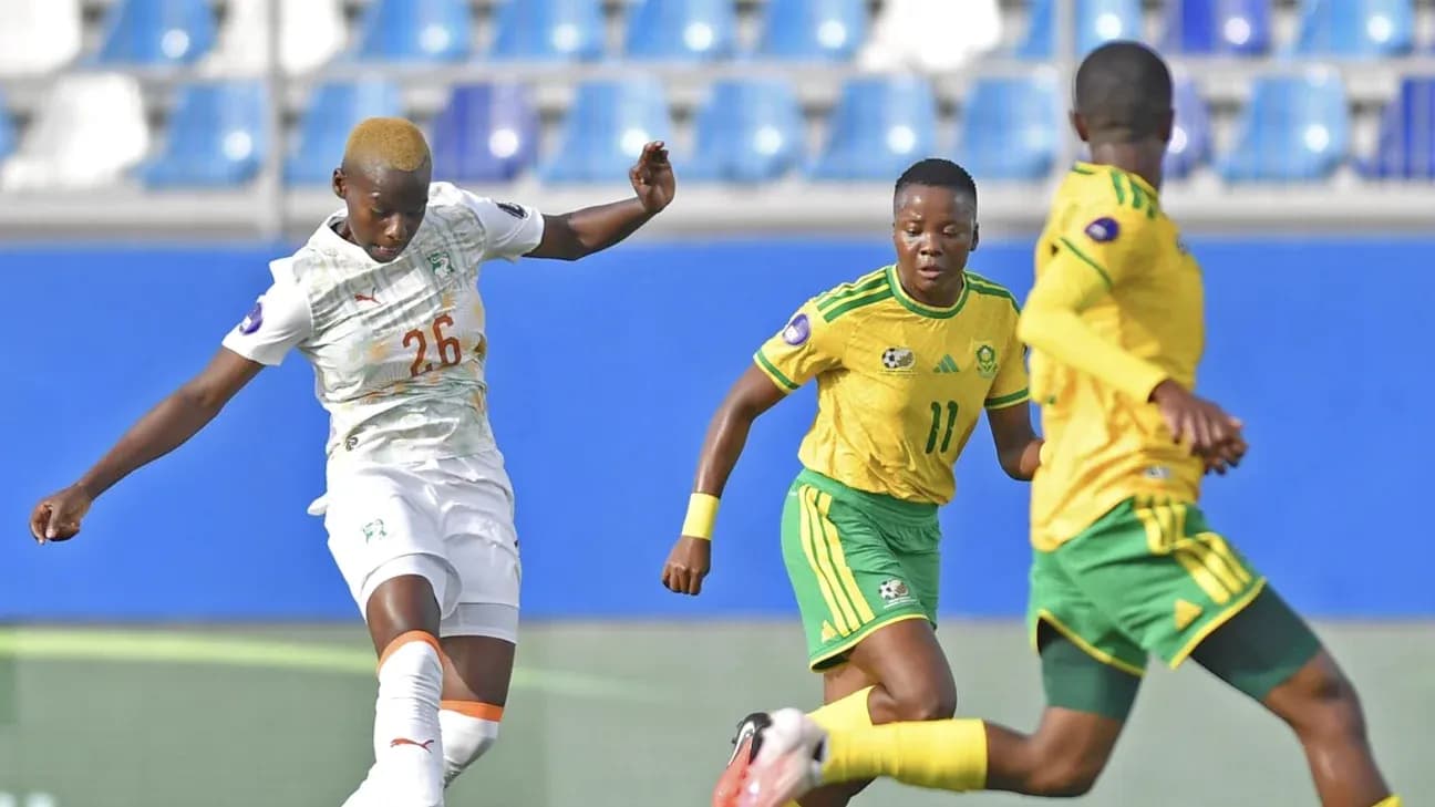Player kicking ball during match between teams