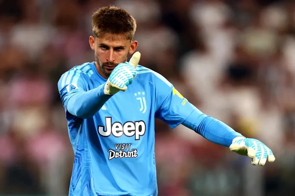 Goalkeeper in blue jersey gesturing during match