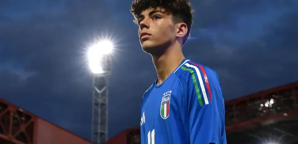 Player in Italy jersey during match warm-up