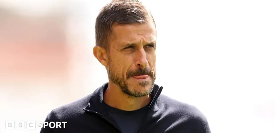 Coach observing during a training session outdoors