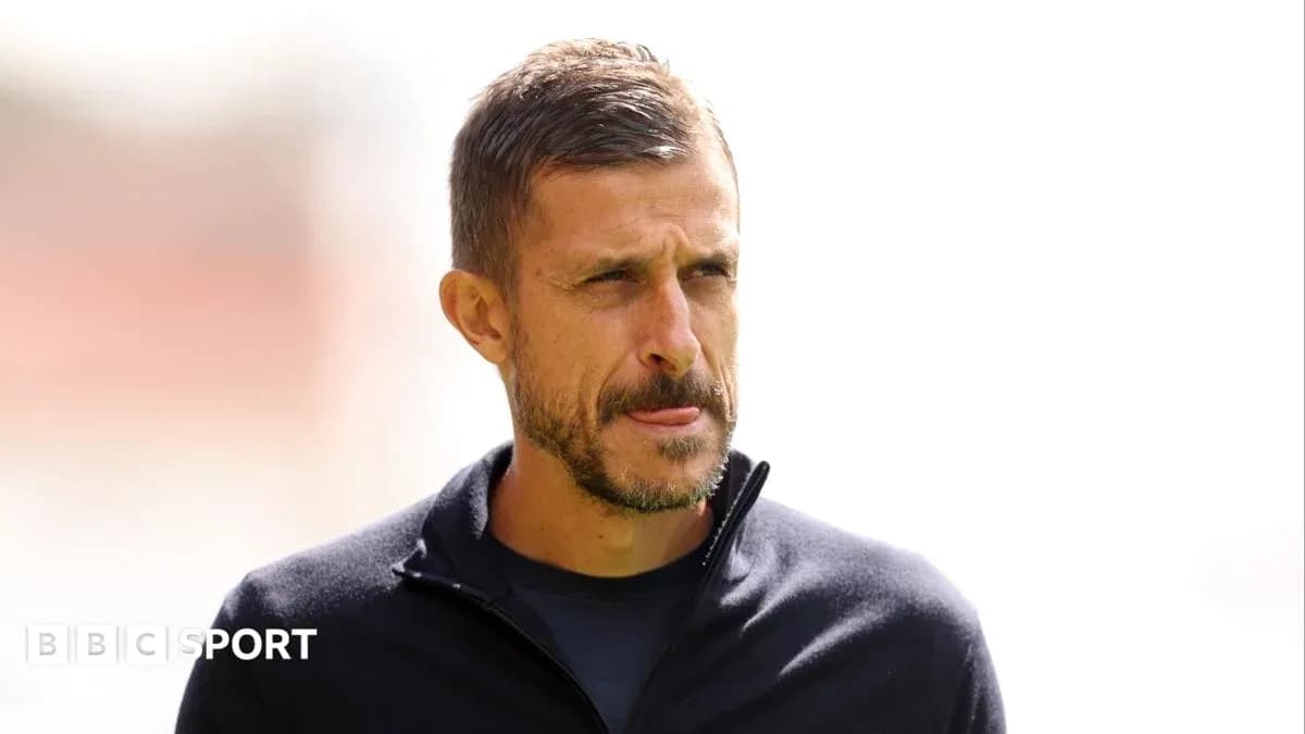 Coach observing during a training session outdoors