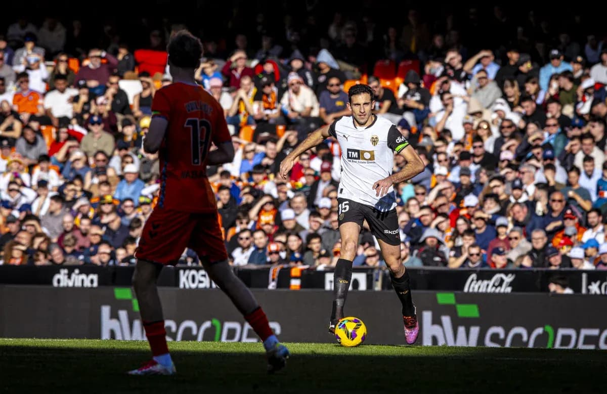 Valencia player dribbling the ball during match