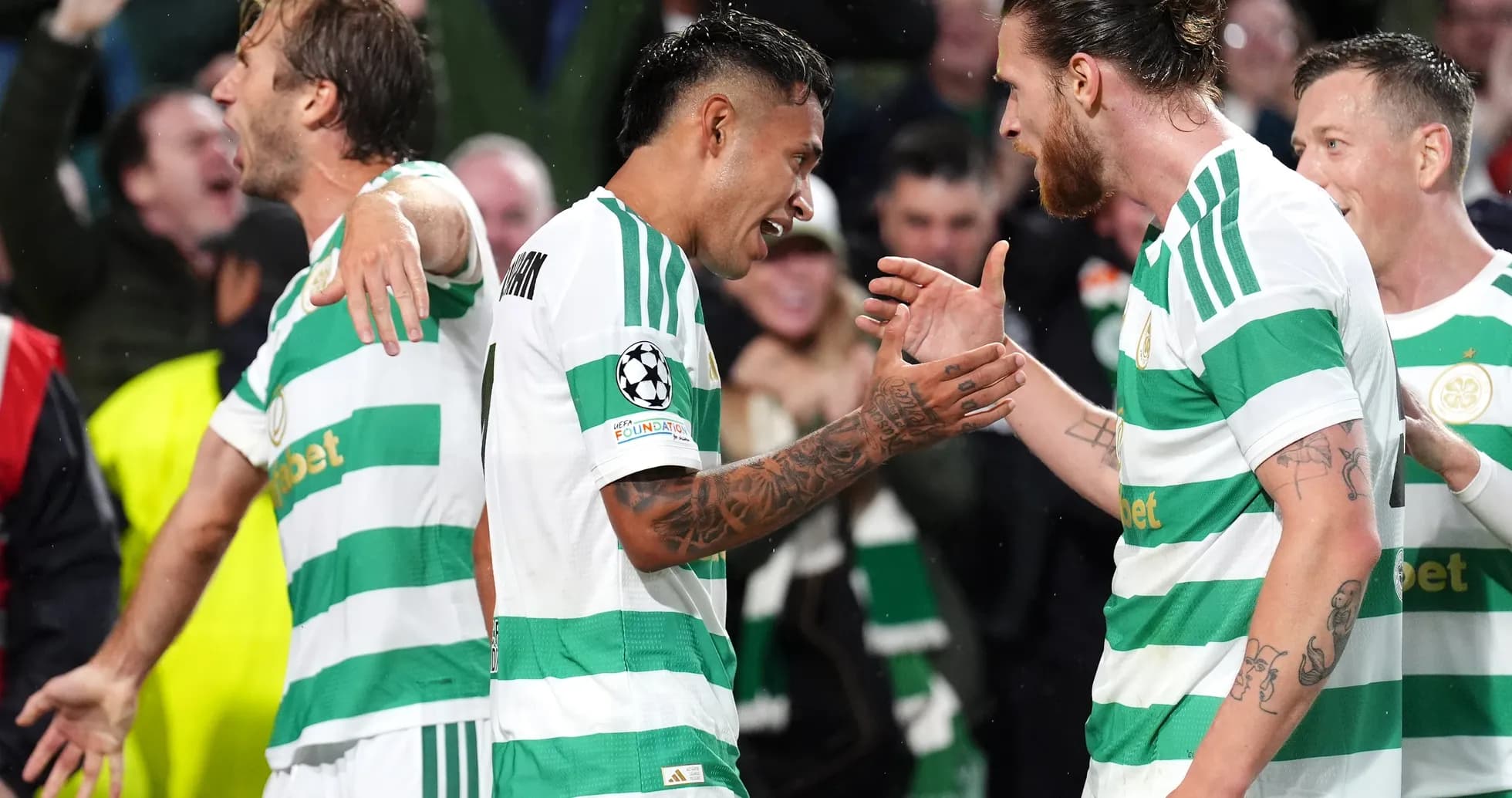 Celtic players celebrating a goal in UEFA match