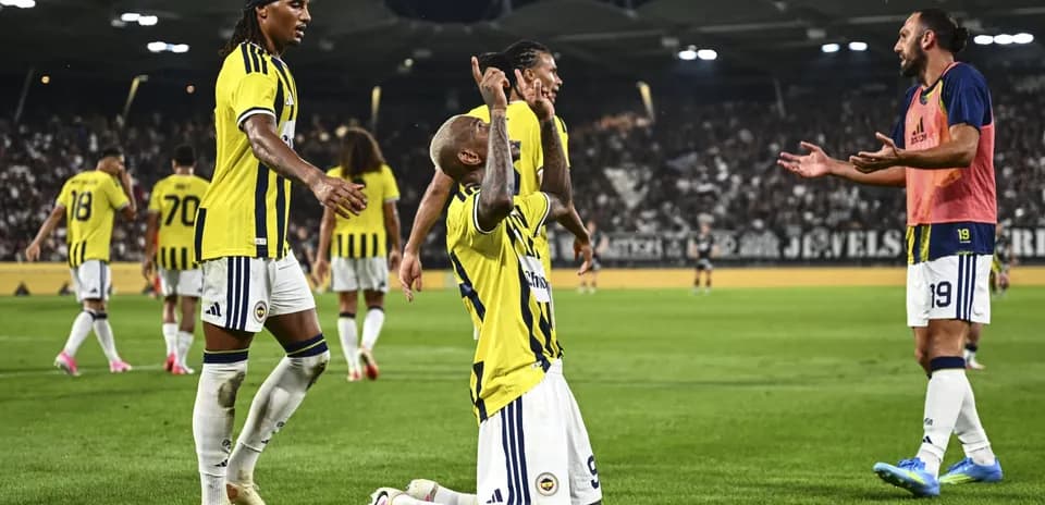 Fenerbahçe players celebrating a goal during match