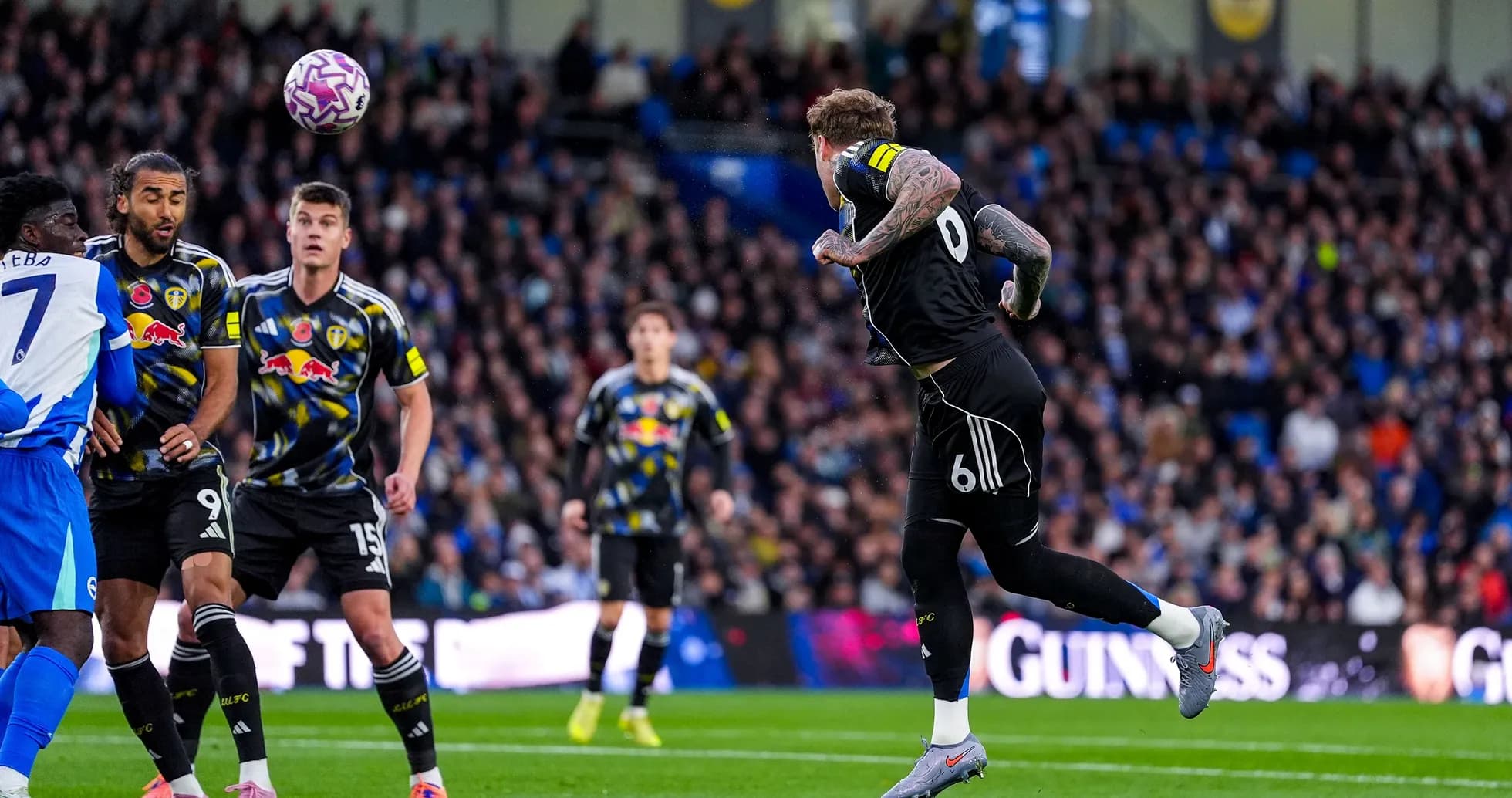 Leeds goalkeeper jumping to catch the ball