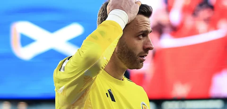 Goalkeeper in yellow jersey during match