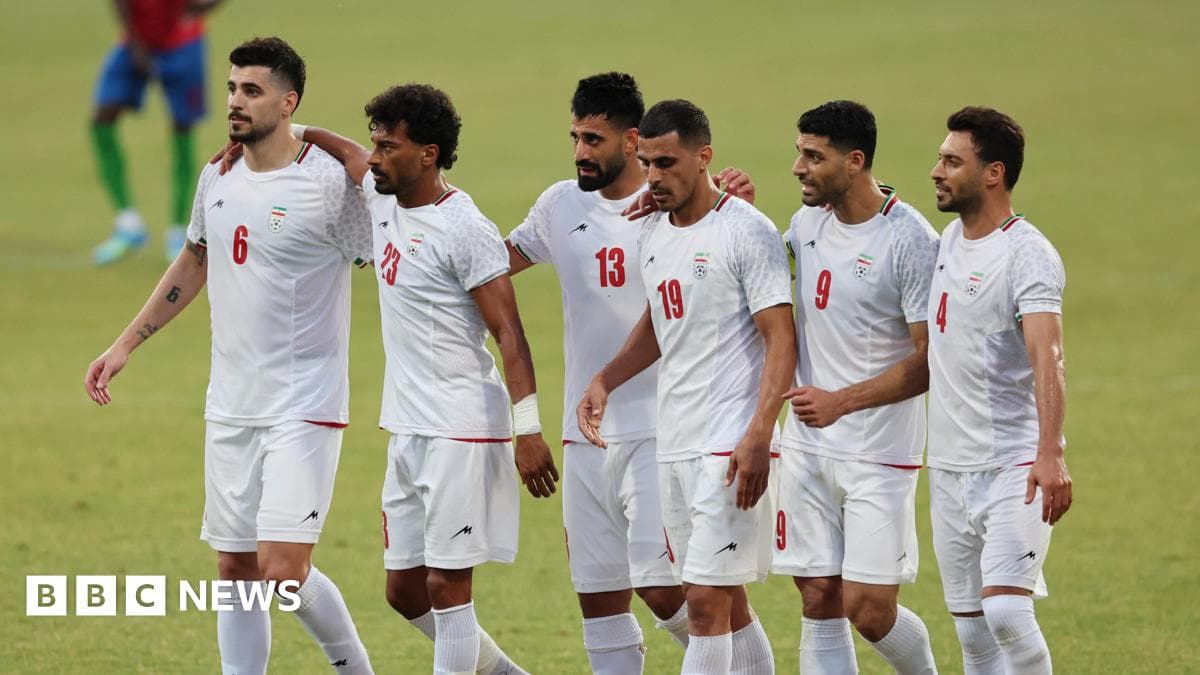 Iranian players celebrating during a football match