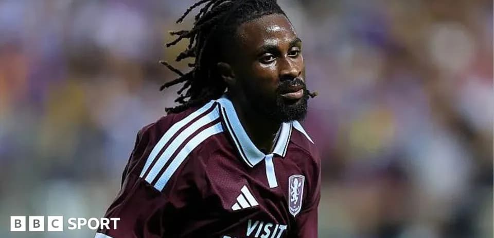 Player wearing maroon jersey during match action