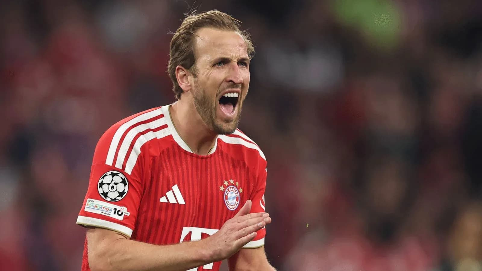 Player celebrating during UEFA Champions League match