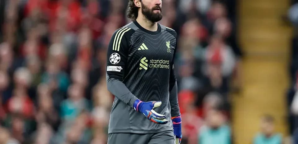 Goalkeeper in action during a match at Anfield