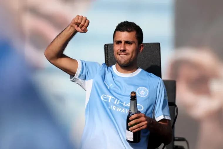 Player celebrating with champagne at event