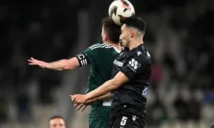 Players competing for the ball during PAOK vs Panathinaikos