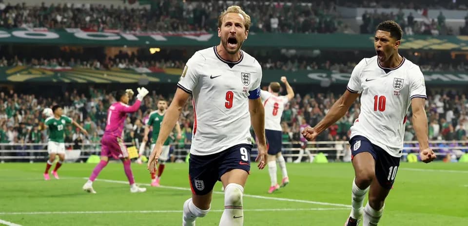 Harry Kane and teammate celebrating a goal