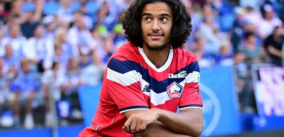 Player sitting on the pitch during a match