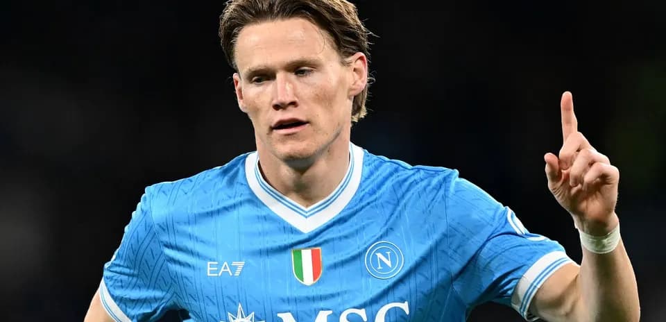 Player in blue Napoli jersey celebrating a goal