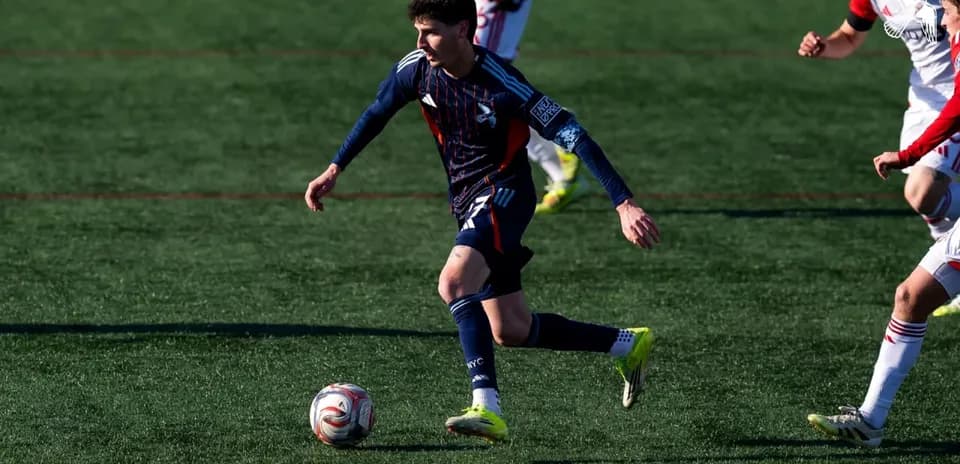 Player dribbling ball during Toronto II vs NYC II match