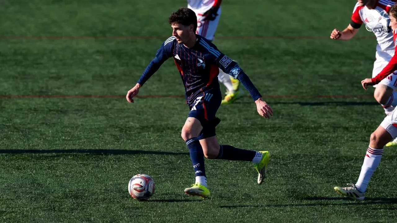 Player dribbling ball during Toronto II vs NYC II match
