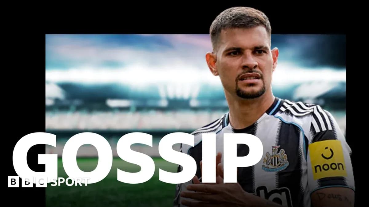 Newcastle player in team kit with stadium background