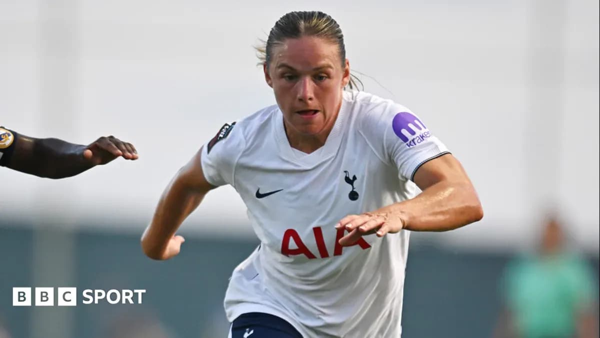 Player sprinting with ball during match for Tottenham