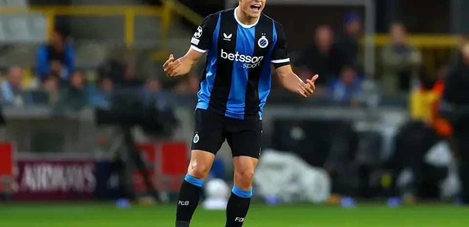 Player gesturing during a football match on field