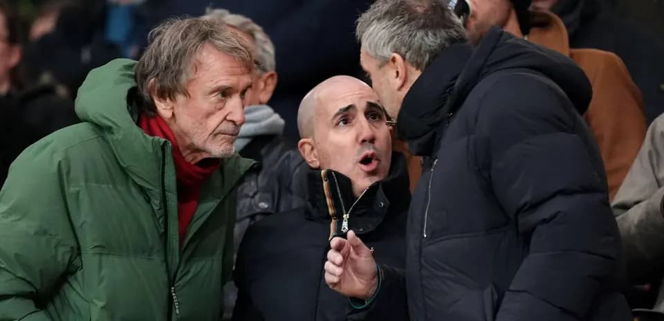 Three spectators discussing during a sports event