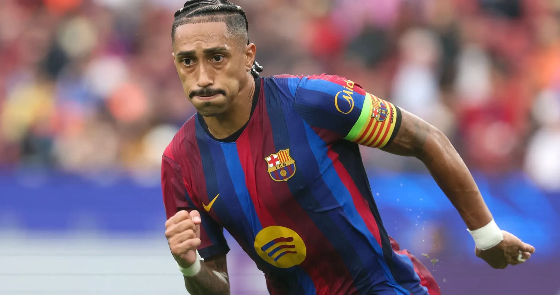 Player running during a match for Barcelona