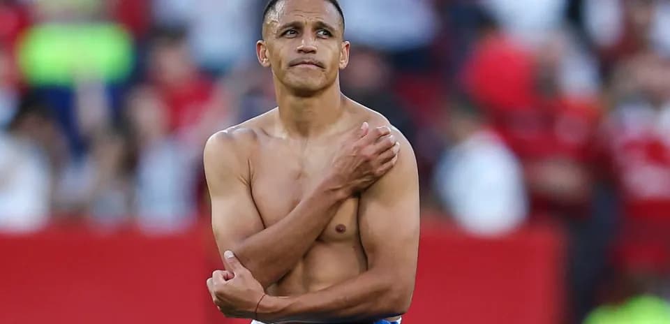 Player with bare torso standing on the field