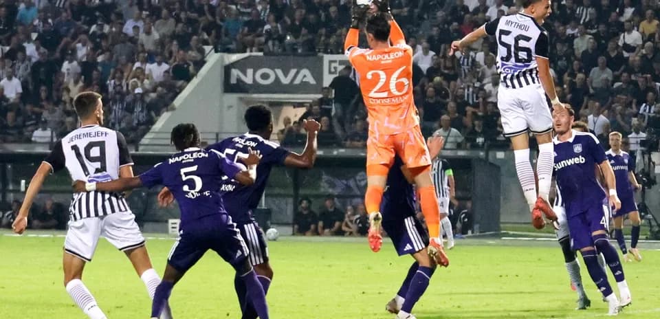 Goalkeeper catching ball during Anderlecht match