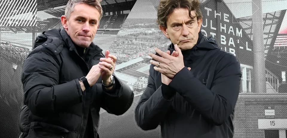 Two football managers clapping in front of stadium