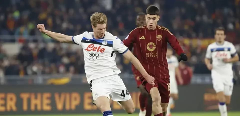Player tackling during AS Roma vs Atalanta match