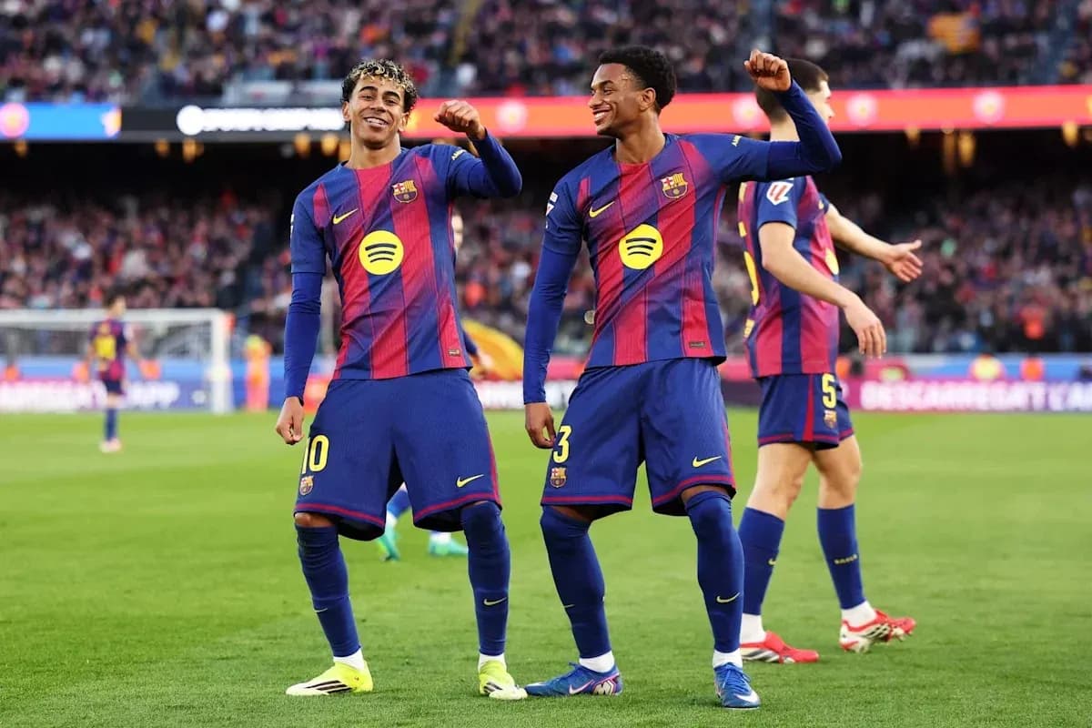 Barcelona players celebrating on the pitch