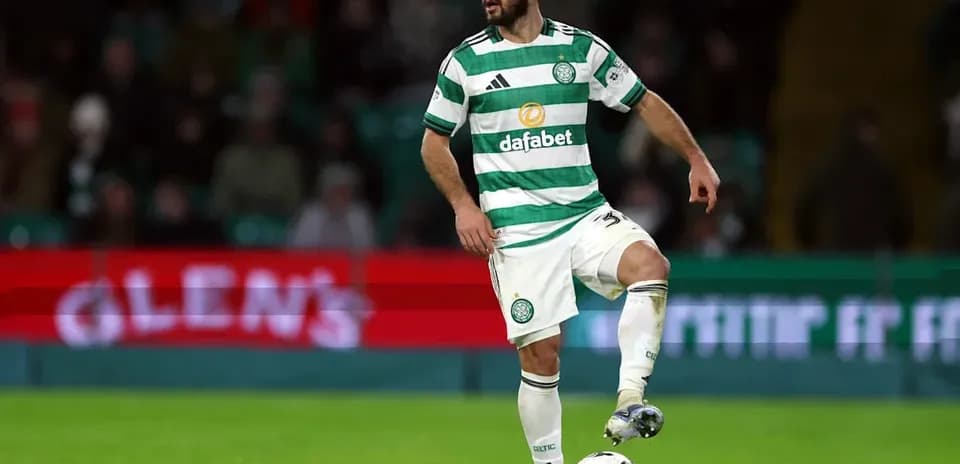 Celtic player controlling ball during match