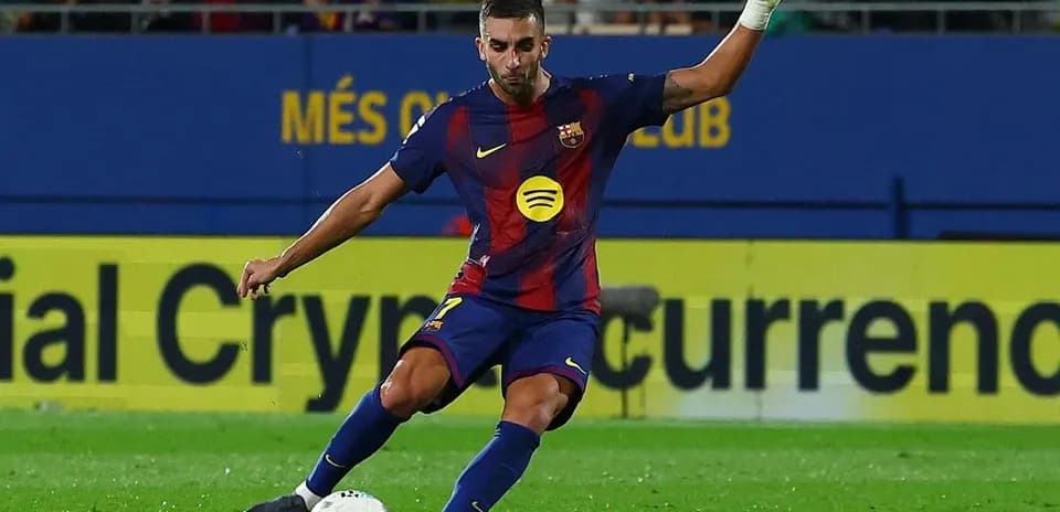 Barcelona player taking a free kick