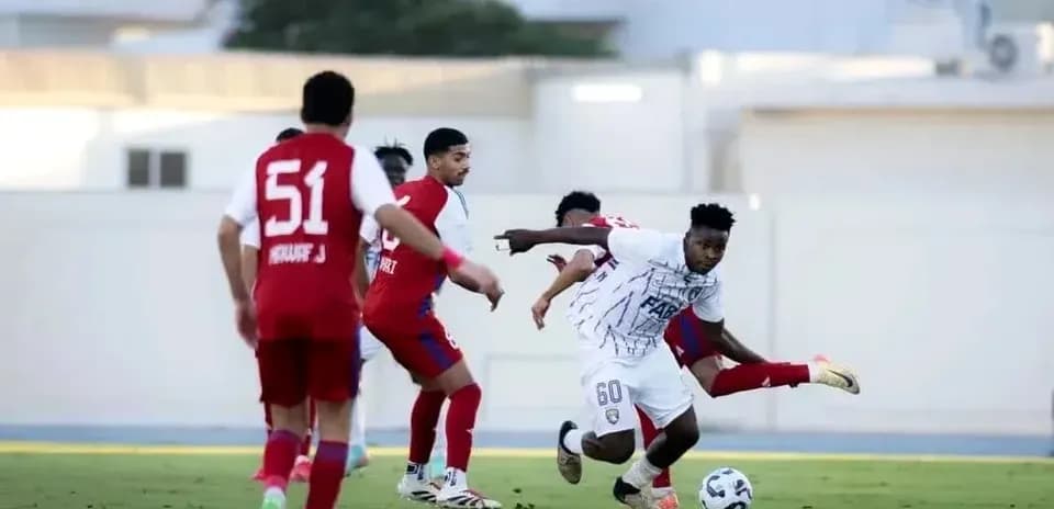 Dibba Al Fujairah U23 player dribbling the ball